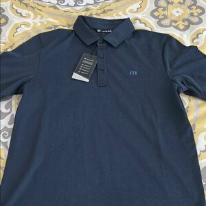 Travis Mathew’s Navy Polo Shirt